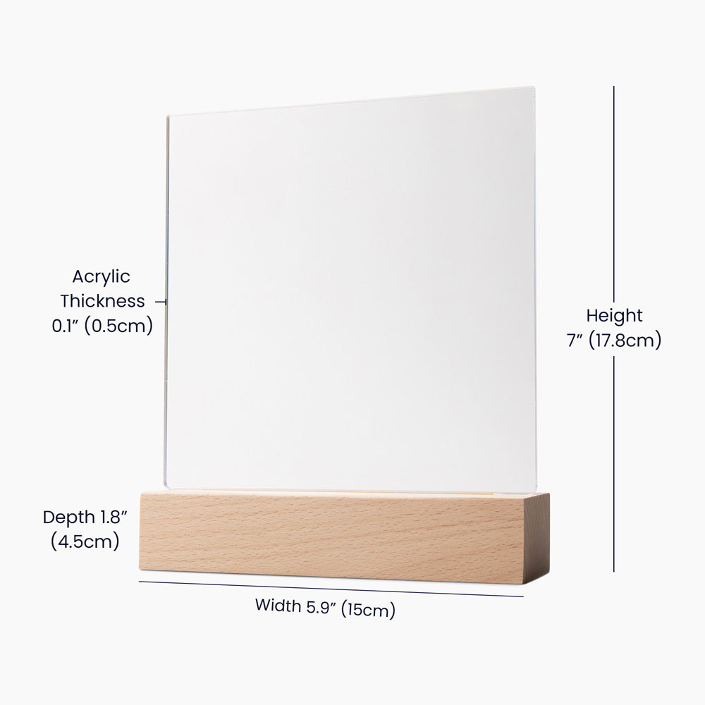 a square piece of white material, possibly a canvas or a piece of paper, mounted on a wooden base. The dimensions of the piece are provided, including its thickness, height, and width.